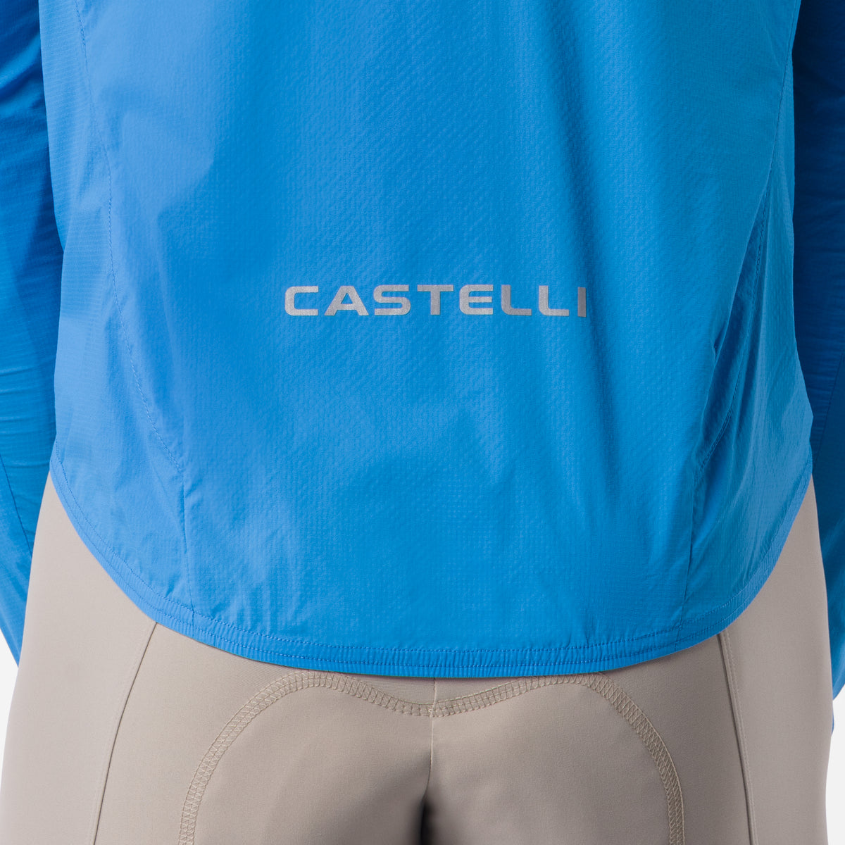 Modrá bunda CASTELLI Transition Air – detail loga na chrbte