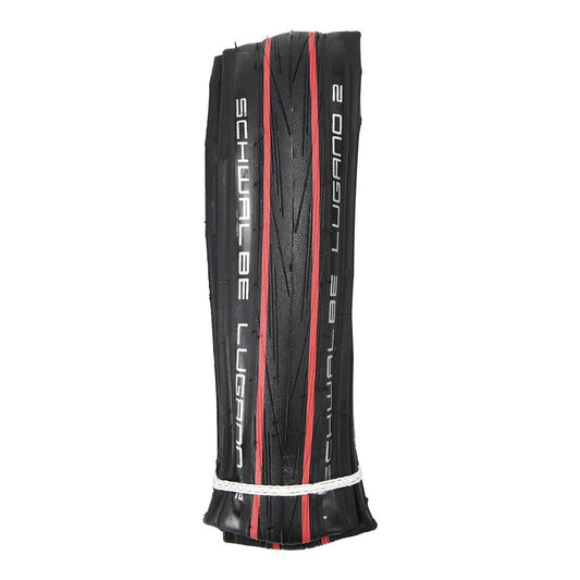 Opona SCHWALBE LUGANO II 700x25c TubeType K-Guard Tubetype miękka czerwona