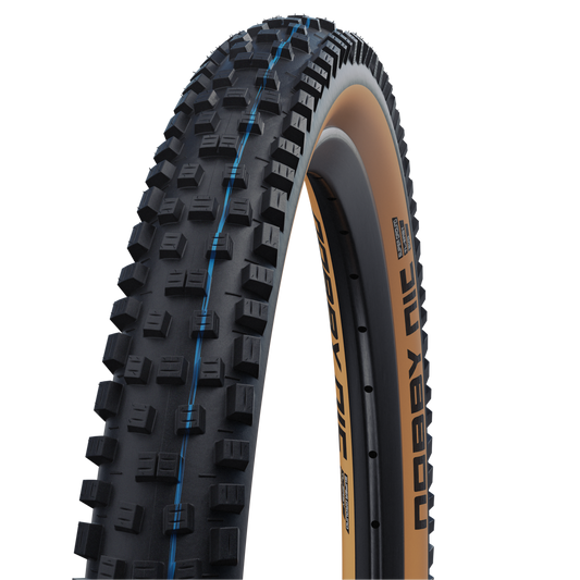 SCHWALBE NOBBY NIC 27.5x2.40 ADDIX SPEEDGRIP SUPERGROUND Tubeless Ready Folding Tyre Black/Brown