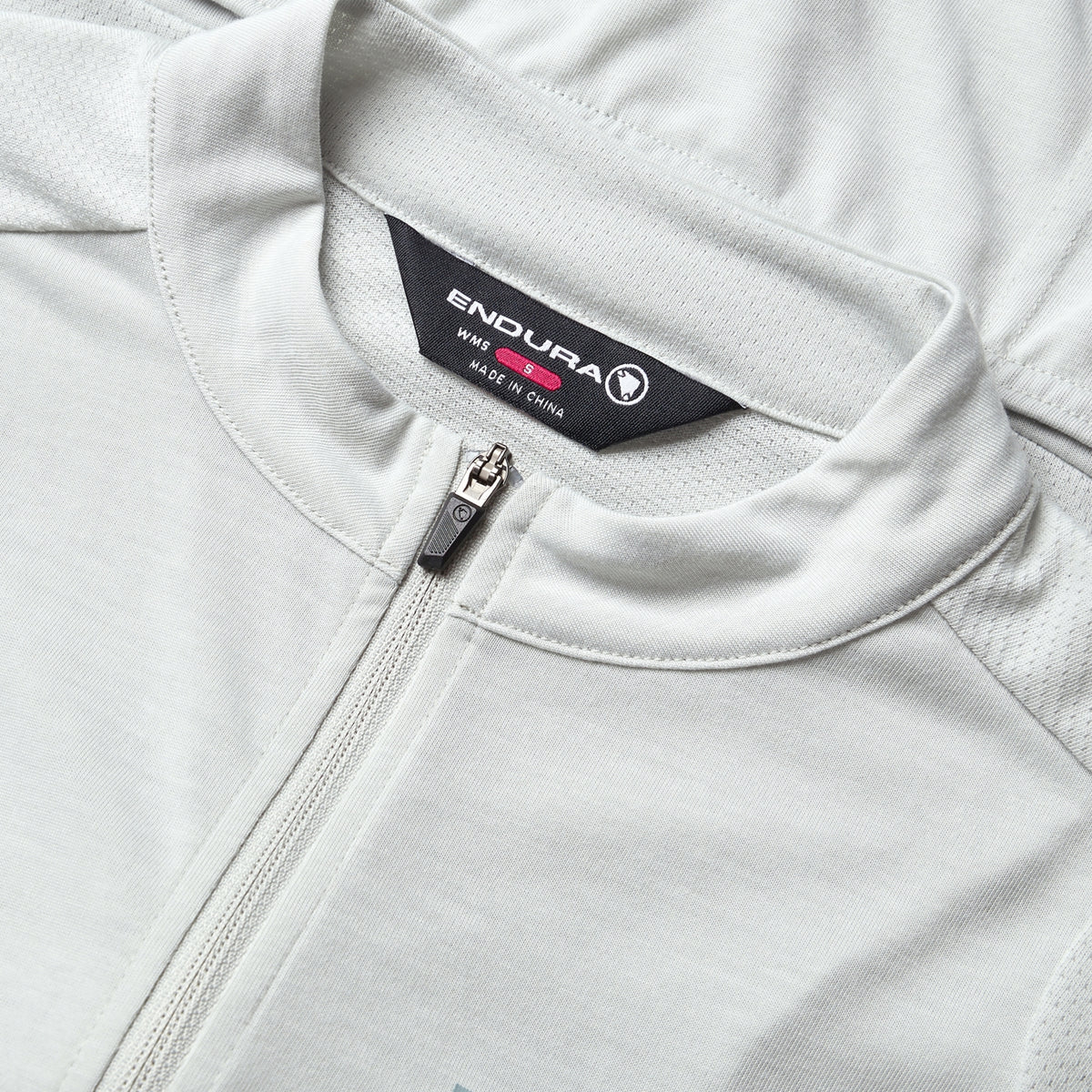 ENDURA LOOP ZIPPED Kortärmad Damtröja Grå