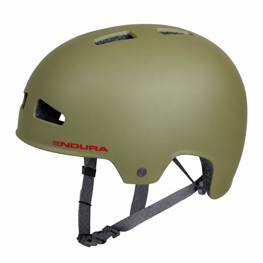 ENDURA PISSPOT green BMX skate-style helmet — product view on a white background