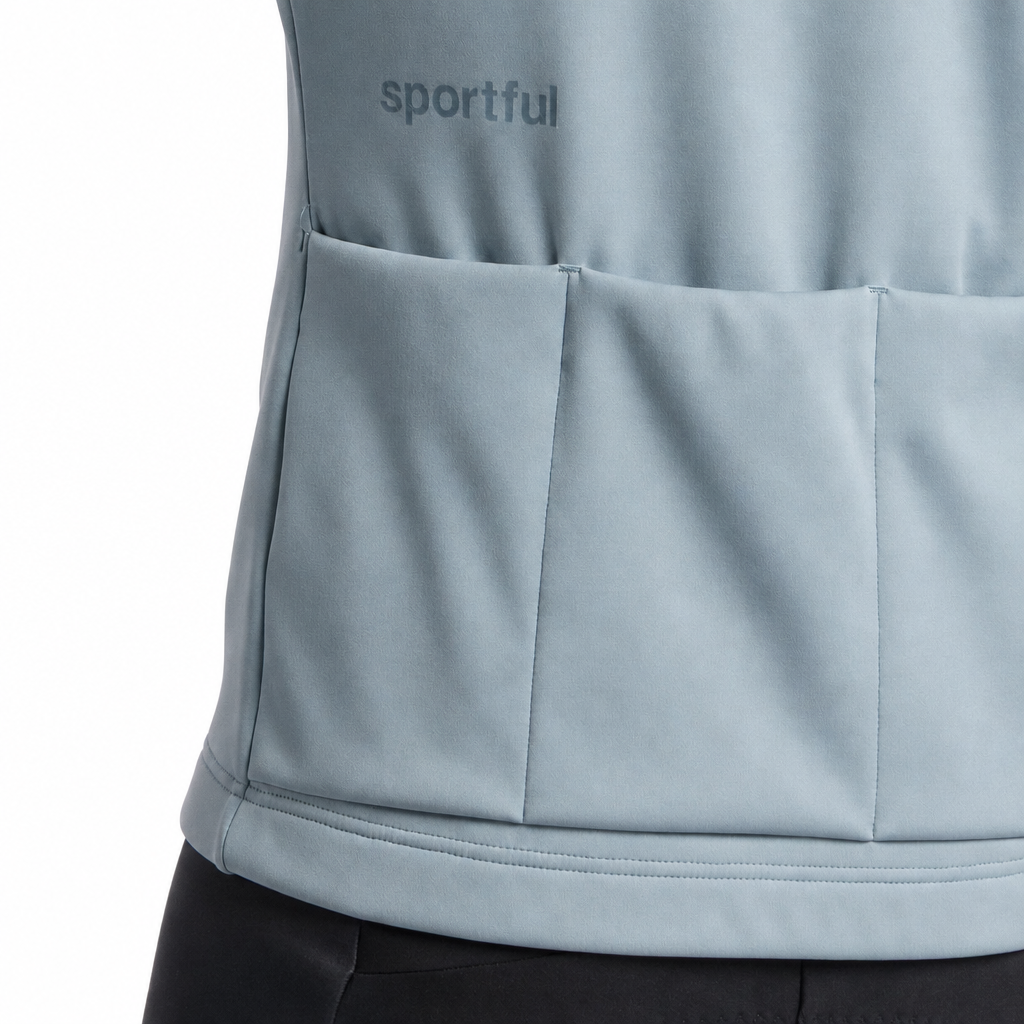 Pilka moteriška SPORTFUL CLASSIC 2 striukė, nugaros kišenės baltame fone